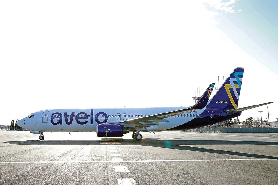 A photo of an airplane with Avelo written on it.