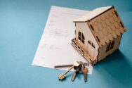 Photo illustration of home with keys and bank statement.