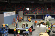 Workers prepare the stage at the Jehovah's Witnesses' convention in Kennewick.