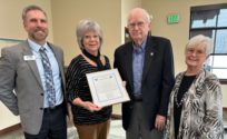 Portrait of Port of Pasco's Jim Klindworth along with Randy Hayden, the port's executive director and commissioners Vicki Gordon and Jean Ryckman.